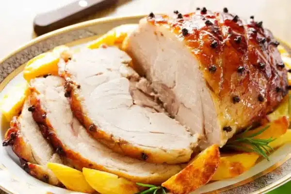 Lombo de porco ao molho de laranja