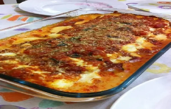 Canelone recheado de queijo e presunto